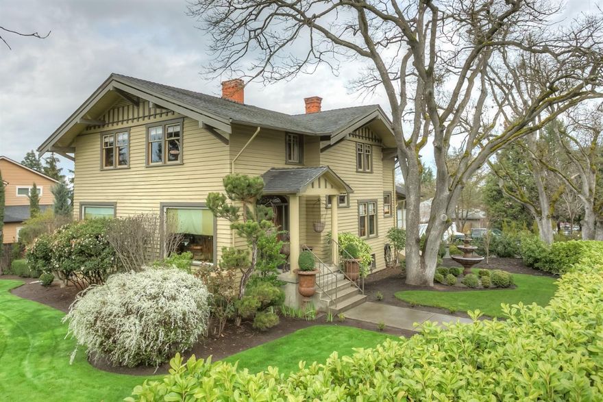 Old school craftsman charm and character on the edge of Old East Medford. Old world woodwork starting w/the grand entry door w/glass transom, wood floors, base molding, crown molding, wainscoting, wood wrapped windows/doors, wood/glass int. doors w/lead caming, antique handle sets/knobs/latches, antique fixtures/some modernized recessed lighting w/dimmers and of course a claw foot tub. Every room is large and features its own theme w/custom color schemes, decorative ceilings, wall coverings, large windows/terrific views f/upstairs. Kitchen is delightful w/antique tile counters/backsplash, beaded copper sink, large free floating island, gas range/oven, microwave and additional side room for supplies/pantry space. Breakfast nook is located off kitchen w/large windows and lots of light. Formal dining area is spacious and can be closed off from the kitchen. Elegant parlor style living room, marble style fireplace and connects to patio. Huge full basement. 2 car gar. Mature landscaping.