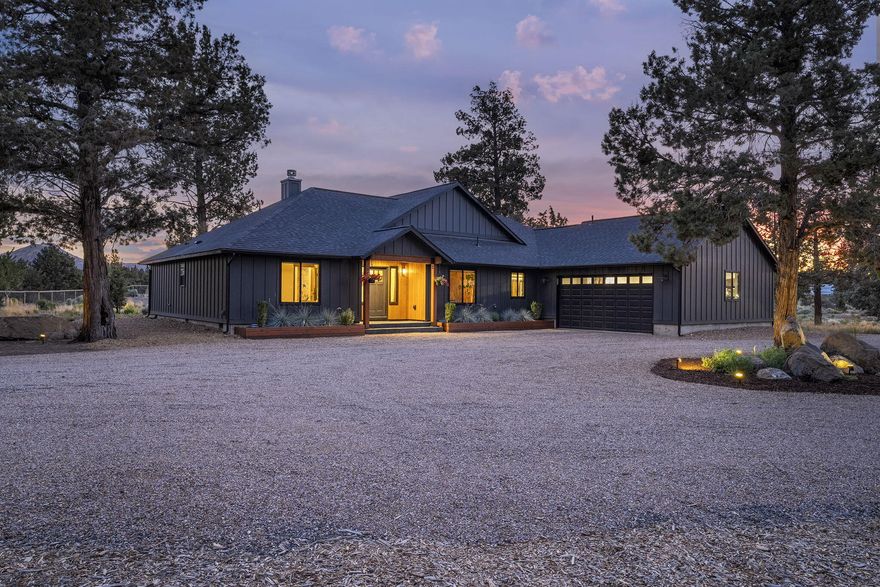 Imagine sipping coffee on a 1,200 SF stamped concrete patio, surrounded by jaw-dropping Three Sisters Mountain Views, in this custom 2,443 SF, 4-bed, 2.5-bath Single Level gem built in 2021 on 2.08 level acres. The lot is fully fenced, landscaped with sprinklers and drip system, a grand entry, electric gate, and full RV hookups. Two 850 SF heated/cooled shops—one currently utilized as a gym.
8 minutes from Sisters, 10 from Bend, and 22 from Redmond, this home is in the golden triangle and Sisters School District. Inside features an open layout, soaring vaulted ceilings, and cozy wood-burning fireplace. LVP floors and Quartzite countertops throughout, stained knotty hickory cabinets, electric blinds and a bar with a prep sink + mini fridge. The primary suite wows with cedar accents 8-foot long tile shower, separate toilet room with a bidet, and walk in closet with built in shelves and dressers. Fall in love with your forever home - this private oasis off a paved road is move-in ready.