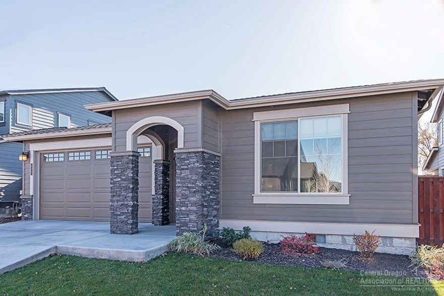 This beautiful Pahlisch home is like new. Enjoy all Ochoco Point has to offer including the neighborhood pool, park, and trails. You will enjoy the layout and single level living with high end finishes including wood laminate floors, air conditioning, quartz counters, stainless steel appliances, and knotty alder cabinets. The back yard has a great covered patio perfect for entertaining. Call your favorite agent to view this home today!