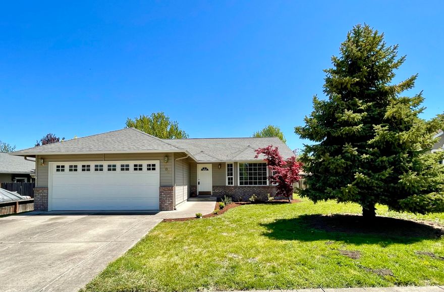 Single-level home in excellent condition and great location with brand new HVAC system and interior paint. This 1995 home has 1490 sqft, 3 bedrooms and 2 bathrooms, including primary bedroom & ensuite bathroom with fiberglass shower and guest bathroom with tub/shower; spacious living room with vaulted ceilings & bay window; vaulted dining area and open kitchen with breakfast bar, lots of cabinetry and access to the backyard; and an attached 2-car garage. Featured throughout are laminate countertops, cross-hatched vinyl windows, vinyl flooring & carpet. The front yard is tastefully landscaped and has mature trees and sprinkler system while the backyard is fully fenced and has a slate-tile patio and plenty of room for playing, entertaining, gardening and/or hobbies. Conveniently located close to shops, groceries, restaurants, Chuck Roberts park, dog park and more, this home and neighborhood have so much to offer including mountain views and a peaceful community.