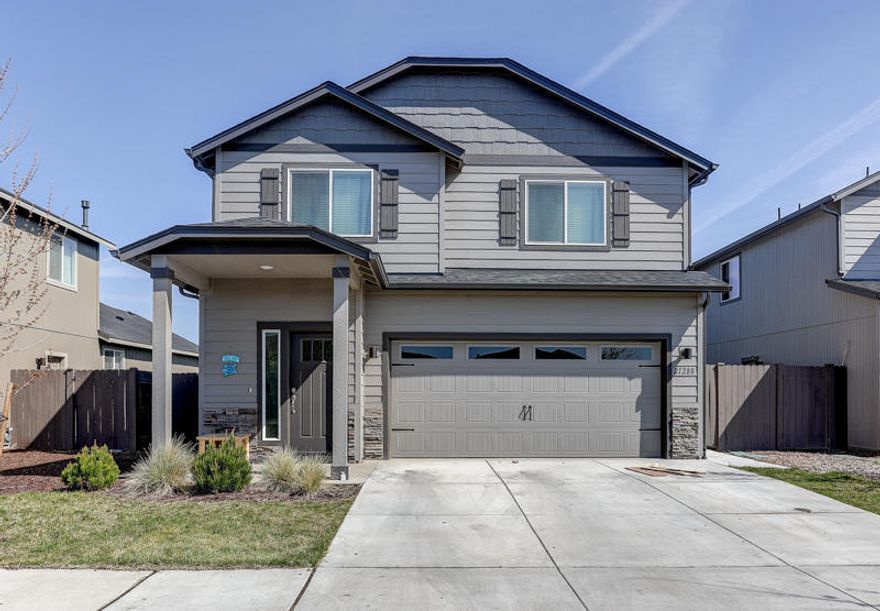 Beautiful like new home in a quiet SE Bend neighborhood.  You will love this 
3 bed/2.5 bath open concept home with a spacious kitchen/dining/living room area.  The home features master on main, upstairs loft, stainless steel appliances, gas cook top, washer/dryer/refrigerator, kitchen quartz countertops, forced air heating, A/C, double vanity, large fenced landscaped back yard, backyard concrete strip, covered front porch, front yard landscaping and a 2-car garage.  Located in NE Bend close to Parks, Schools, Costco, Essential Shopping and Medical/Hospital. Call your favorite realtor today to schedule your private showing.