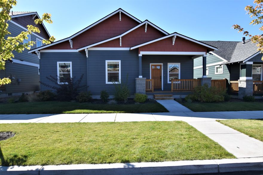 This like new single level craftsman home was built in 2018 and is located in Bend's Oakview neighborhood. As you enter into the great room you will love the wood flooring throughout, gas fireplace and vaulted ceilings. The kitchen is open and incredibly space and boasts stainless appliances, breakfast bar, quartz counters and a large pantry. Off the kitchen is the laundry room and down the hall you will find 2 guest bedrooms and full guest bath. The primary bedroom includes vaulted ceilings, large walk-in closet and a double vanity. Stay comfortable year-round with natural gas forced air and air conditioning. The backyard is fully fenced complete with sprinkler system and deck. There is a 2-car alley garage with storage and much more! Close to schools, shopping and medical!