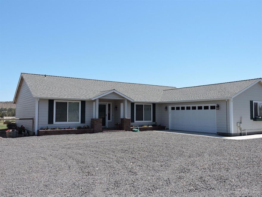 Beautiful Redmond ranch/horse property on almost 15 acres, with 13 irrigated acres. Hard to find, close in Redmond, location. Newer single level home, beautiful landscape & rustic barn, and additional shop storage, with dog kennel and chicken coop. Views, pond, and fully fenced property make this a must see!