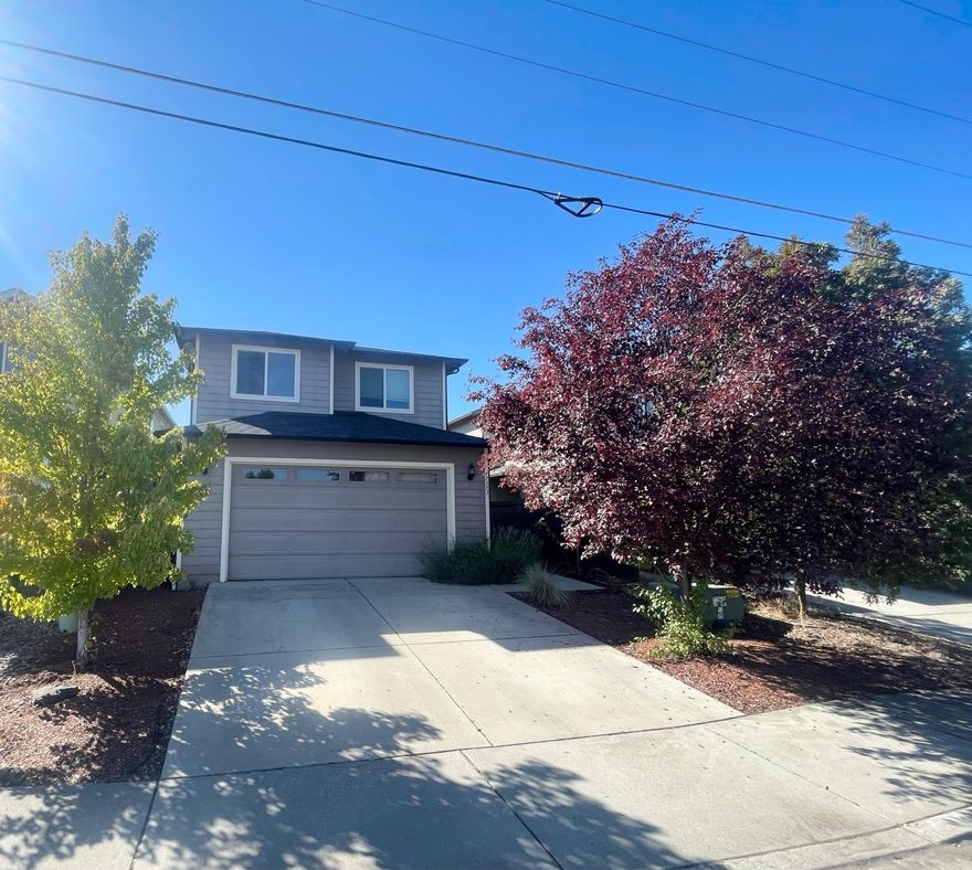 Broker friendly,  Updated 3-bedroom, 2.5-bath single-family home nestled in a quiet White City neighborhood. The garage is now a versatile bonus space with a dedicated 10x11 office and large bonus room.  The backyard has been professionally landscaped to expand the space and a gravel firepit area has been added.  On the main floor you'll find hardwood floors, granite countertops, an upgraded gas stove, a walk-in pantry, and a large under-stair closet.  Upstairs, the bedroom level boasts two walk-in closets, a dedicated laundry room, and a large primary suite with an ensuite bathroom and cozy balcony.