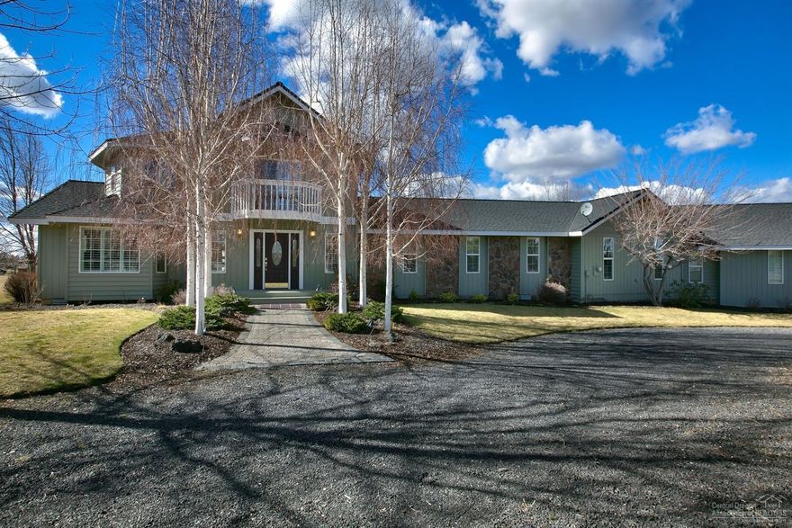 Country living at it's finest, full views of Cascades...all on 4.78 ac. Room for everyone plus animals. Lots of elbow room in this quiet setting. 3300+sf home with generous family room and large great room that opens to the outside and views,plus 36x36 barn with 2 stalls and hay loft, 220 power and hot-wired arena. Fenced and gated. Security system, central vac, granite....new smoke alarms and co2 detectors as well.. Ready for a great family home. 15 min. to Brasada!