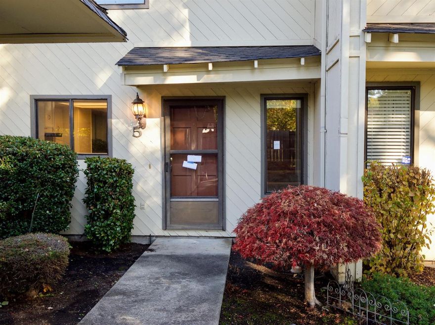 Clean and charming townhome in East Medford! This 2 bed/1.5bath home features a large dining room/living room with slider to rear patio & fenced yard. The kitchen is nicely laid out with ample counter space, a window for natural light, and a breakfast bar. Also downstairs is a half bath. Upstairs are two bedrooms, a full bath, and hookups for washer and dryer. HOA fees include water, garbage, sewer, landscaping, & care of roof, siding & parking lot. Easy living, plus a great location close to schools, shopping, medical facilities, and recreation, all at a hard-to-find price. Must see!