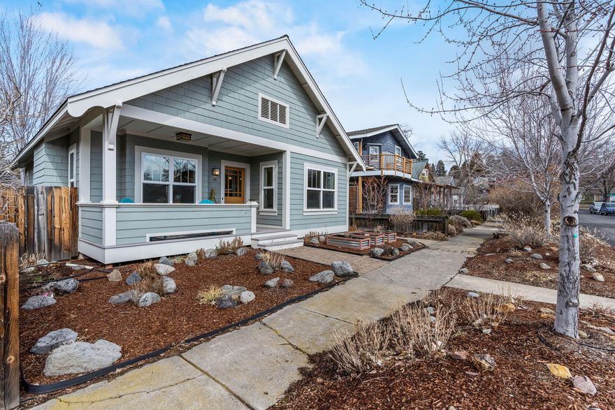 Rare Legacy Land Use Permit! In the heart of Bend close to Drake Park, Old Mill District, Downtown and the Deschutes River. 2004 construction with charming vintage style details and finishes. 9.5' ceilings, light and bright open floor plan with beautifully tiled fireplace, tiled shower/bath with jetted tub, spacious bedrooms with ample storage, one offering a large walk in closet. A/C, whole home humidifier, tankless water heater. A magical fenced and paved courtyard in the rear of the property provides a private entertaining space to gather with family and friends! Detached heated double car garage with workshop area and additional gated RV/boat pad.  Enjoy paddle and surfboarding at the Whitewater Park; restaurants, shopping and community events just blocks from this spectacular Westside location!