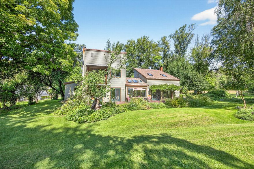 Amazing and unique two-family setup on the Little Applegate River! This exceptional property offers 13+ acres across two legal parcels zoned RR5, with 800 feet of gorgeous, accessible river frontage. Perfect gravity-fed irrigation supports lush gardens, lawns, and fenced pastures, creating a park-like setting. The property also borders thousands of acres of pristine BLM land, providing unmatched privacy, recreation, and natural beauty. The main home offers dual living potential with separate kitchens, bedrooms, and living areas—ideal for extended family, guests, or income. Expansive grounds include established gardens, open grass areas, and tranquil spaces that invite relaxation and connection with nature. From private retreats to family gatherings, this is a dream property that checks every box. Private, serene, and versatile, this riverside estate is perfect for those seeking self-sufficiency, recreation, and the beauty of Southern Oregon living. Don't miss this rare opportunity!