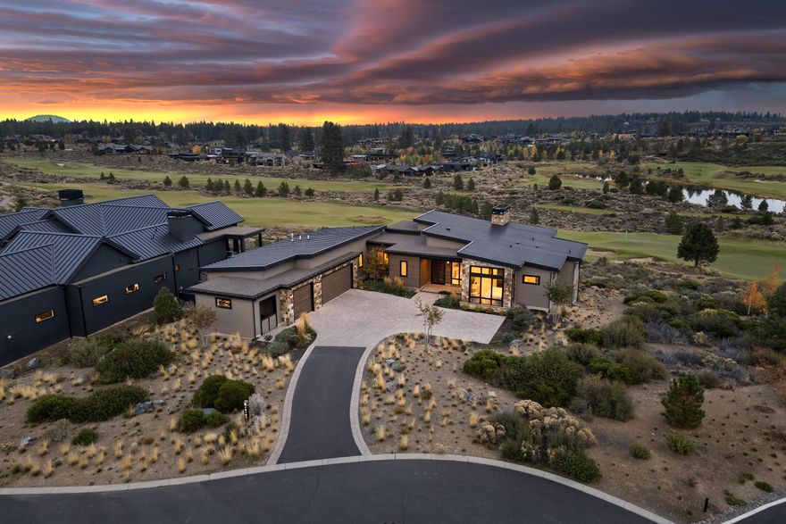 Located at the end of the cul-de-sac of the well sought after neighborhood, Tartan Druim & overlooking Tetherow's prestigious Kidd's Corner is where you will find this elegant custom home. This impressive, light-filled home captures the vast views from top to bottom. Graced w/high end finishes & fun touches, you'll find all the bells & whistles throughout this thoughtfully designed home. On the main level you'll find an airy primary suite w/a dual vanity, heated floors, & a roomy walk in closet, an open great room w/a striking wood burning fireplace, an entertainers kitchen w/top of the line appliances incl. a beverage fridge & built in coffee maker, a secondary en-suite, office, powder room, mud/laundry room, 3 car garage w/storage room, 2 balconies, & a built-in BBQ. The lower level features a bonus room w/a kitchenette, 2 bedrooms & bathrooms, a paver patio & grass area. Whether living here full time or part time, you'll rest easy w/the Lutron smart system. Why live anywhere else?