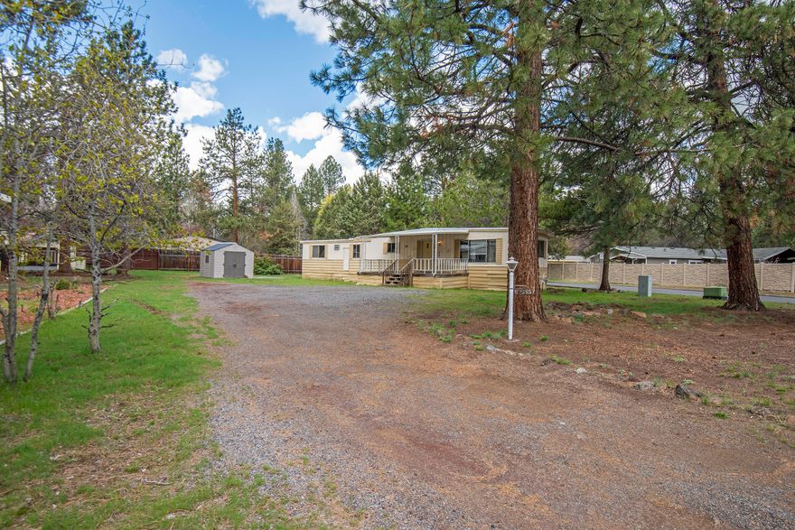 Clean, flat and spacious corner lot ideally located in SW Bend with no HOA's. No monthly land lease like the parks charge! Own the .24 acre of land and experience affordable living in Bend! Less than 2 miles to Old Mill and the river trail, minutes to Hwy 97, and across the street from the clubhouse. Vintage 1971 single wide mobile home is ready for your creativity and imagination! Or, continue using as an investment property, as it has been for two decades. Sold as is. Owners will not do any repairs. Optional low monthly HOA allows use of clubhouse, pool and other amenities. Buyer to do own due diligence should they choose to remove existing structure, in regards to what the City of Bend allows to replace it.