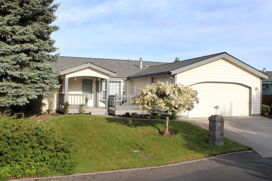 Wow! Come see Coveted Mountain View Park, and this lovely triple wide home situated centrally & well away from road noises, this home boasts mountain views; a large kitchen with Included refrigerator, breakfast nook & pantry; a gas fireplace surrounded by tinted picture windows; updated LVP flooring & much more. A large deck overlooks rooftops & pickleball court, perfect for views of Pilot Butte. From your deck or out your windows, watch for painted sunsets over the Cascade Mountains to take your breath away. The Utility Room includes Washer & Dryer. Two car attached garage includes cabinets & work surface. Primary bedroom with ensuite bath. Newer roof, a major maintenance item you won't need to address for many years! Mountain View Park includes use of swimming pool & pickleball court. Front yard mowing & street snow removal included. RV Parking when available, extra fee. Only a mile to grocery store, restaurants and shops. Home is not for rent.