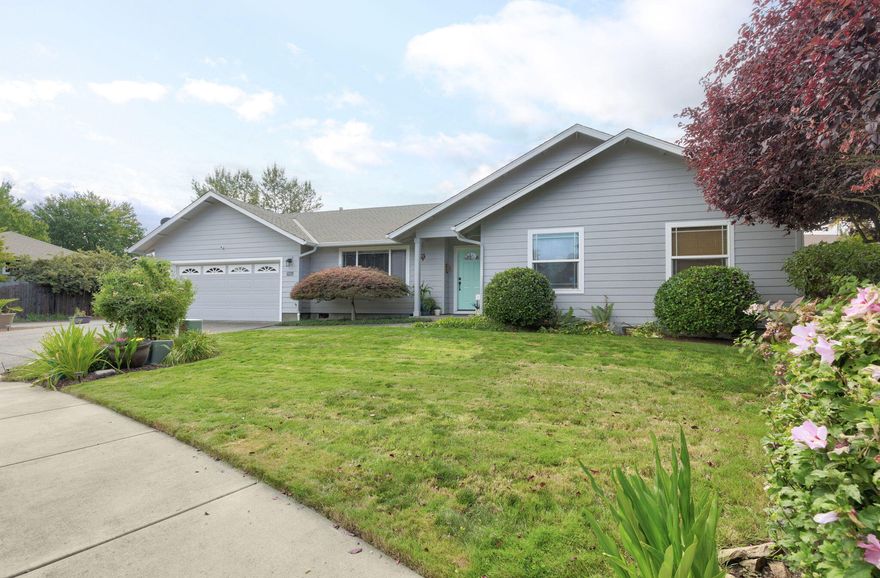 Immaculate home!  Just  minutes from anything you would need or want to do in Grants Pass! Conveniently located to the hospital, movies, shopping, schools and restaurants. This home has a welcoming open floor plan, fresh exterior paint,  a spacious kitchen with beautiful granite countertops and tile backsplash,  plenty of space in the living and dining room  and large bedrooms! The backyard has mature landscaping that provides seclusion and privacy with easy maintenance. You won't want to miss this beauty, call for a showing today!