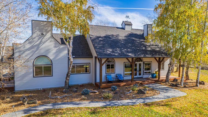 Stunning Cascade Mountain views on nearly 10 acres conveniently located between Bend & Sisters. 3 bedrooms, 2.5 bathrooms, vaulted great room, dining room,  kitchen w/ new stainless fridge & induction range, office space, laundry room, plenty of storage, & family room complete w/ wet bar & stone surround fireplace make up nearly 2500 sf of one-level luxury living. The primary suite includes a large walk-in closet w/ custom shelving, & ensuite bath w/ tile shower & jetted tub, separated nicely from 2 guest bedrooms that share a tastefully updated full bath. Outside you'll love the private back deck w/ views of the beautiful water feature flowing into your own cold plunge pool, flagstone walkway/patio, storage shed, as well as multiple other decks, covered front porch, & oasis-like landscaping. The detached 3-car garage includes an unfinished bonus space ready for your ideas as well as an attached separate shop area. Zoning allows for horses and livestock too. Bring your vision!