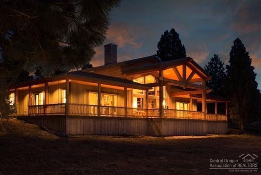 Country living at its best in Bend! Stunning single level home with panoramic mountain views from most rooms & just minutes to town. Quality crafted home with 3 full bedroom suites, great room w/soaring ceilings, stone fireplace, gourmet kitchen w/granite island, huge office/family room & full wrap-around cedar decks for outdoor living. Just like new with 4 bay garage w/shop, deluxe barn/RV garage, new pond, underground irrigated pastures & canal. You must see this incredible home!
