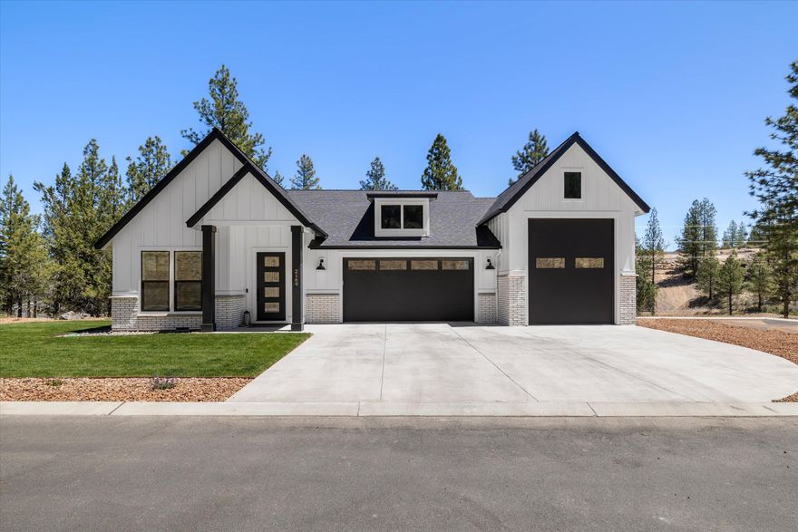 Gorgeous custom home built by Raasch Homes.  This was completed in February of 2024 and was the builder's own residence.  19338 sq ft private lot with plenty of greenspace and walking path access to NW Crossings restaurants and shops.  The open floor plan is full of extensive upgrades.  Dream kitchen with a 9' island, beautiful Cambria counter tops, Professional JennAir appliance package including built in wine refrigerator.  Luxurious master suite with heated tile floors & custom shower.  Great room features built in cabinets and a 4' lineal gas fireplace.  2 zone furnace and AC system for energy efficiency.  Whole house vacuum system.  Large 26'x12' covered 40 yr. warranty Trex deck with black wrought iron railing.  3rd garage bay that measures 13'x32' with full hook ups.  Exterior hot and cold faucet.  Fully landscaped and irrigated. This home is a perfect blend of elegance, function and comfort.