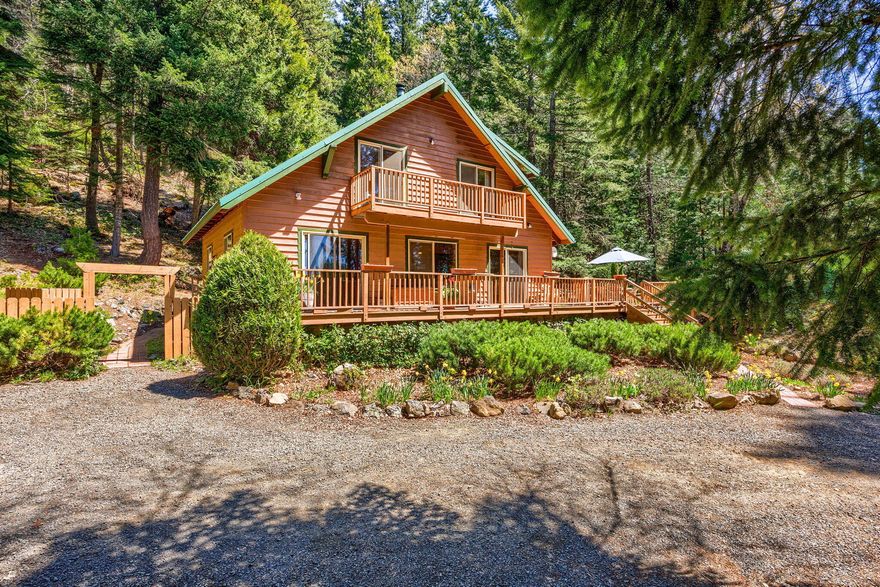 Your quiet mountain retreat awaits! Don't miss this special home close to the Pacific Crest Trail and Cascade-Siskiyou National Monument with views of Mt. Ashland and Pilot Rock. The custom built 2 story home has 3 bedrooms plus an office, 2 bathrooms, open living space with a freestanding wood stove and is adorned with wood beams and pine flooring throughout. The large deck extends the living space and provides an outdoor retreat incorporating the natural landscape. On the 5 acres you have ample parking for vehicles and toys, multiple storage sheds, garden beds and hiking trails. When you want to be connected, Greenspring Broadband is available. The owned solar panels help offset the public utility, and the new well pump, pressure tank, water softener and filtration system plus the holding tanks provide peace of mind. Don't miss this special property that has been loved for nearly 30 years. Call for an appointment today!