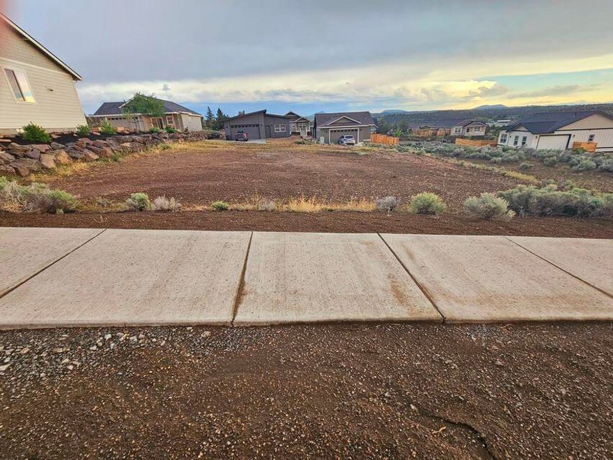 Looking for a clean, buildable lot in a great location? Look no more! This beautiful 0.18 acres lot is located in the wonderful Yarrow subdivision. Take in amazing Cascade Mountain views and gorgeous colorful skies. This lot is close to the Madras Aquatic Center, schools, trails, walking paths, and parks. You won't want to miss this opportunity! Call today for more details and start building the home your dreams. Seller is highly motivated!