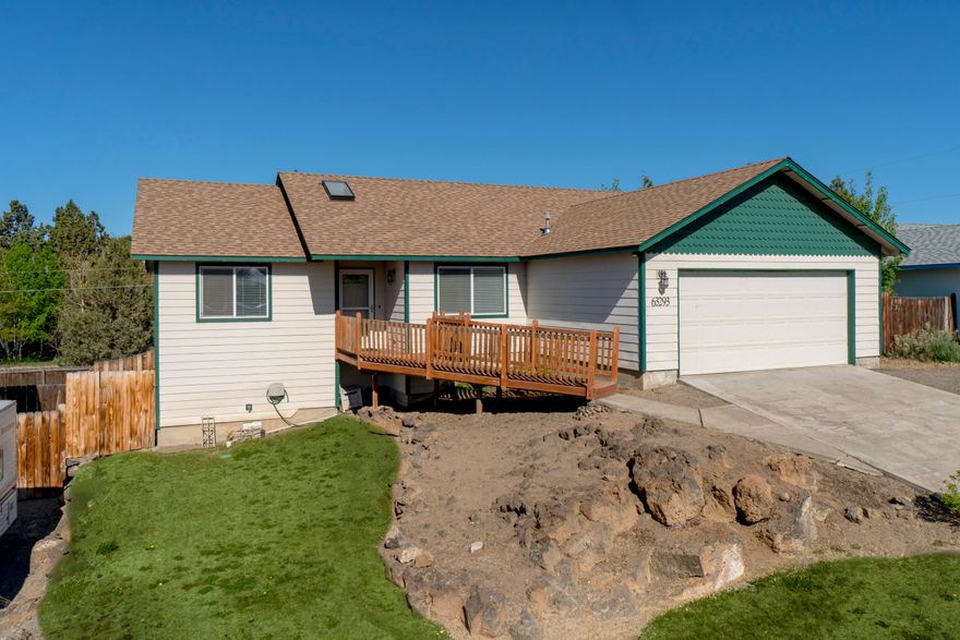 Well appointed, beautiful single level home on Bend's popular NE side. Many windows & skylights make this home extra light & bright with an open floor plan plus vaulted ceilings. Features 4 bedrooms, separation from the master, 2 bathrooms, vaulted ceilings, tile & laminate wood floors, stainless appliances, gas furnace with A/C, fenced back yard, deck & landscaped. Home is close to city amenities such as schools, parks & shopping. Situated on an elevated larger lot w/views of Pilot Butte from the front & back yards plus; new roof installed in 2015.