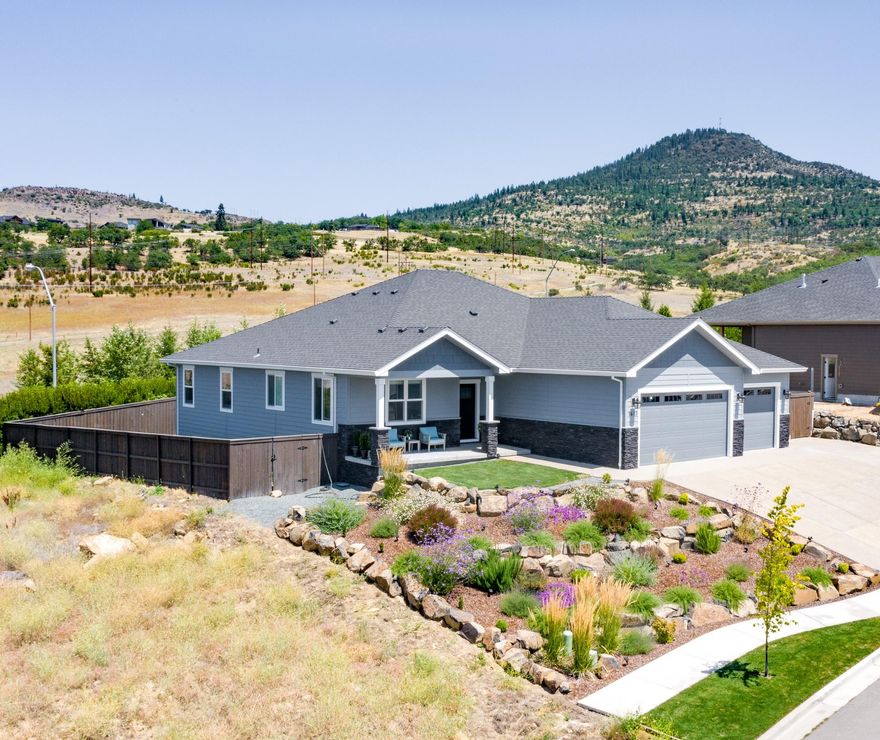 Stunning Views in desirable Bella Vista Heights Subdivision. Beautiful, Single Level, 2046 sqft, 4 bed, 2.5 bath home has a great layout & split floor plan. Built in 2018. Dream white kitchen w/quartz counter tops/large island/gas cook top/oven/huge pantry.  Gorgeous, gray, water proof/scratch resistant vinyl flooring throughout with gray carpet in bedrooms. Vaulted 12' ceilings in main living area w/9' ceilings throughout.  Floor to ceiling cultured stone fireplace & gray wood mantle. Spacious laundry rm & 1/2 bath at garage entry.  Master suite & dining rm have doors w/windows that lead to covered patio with gas & spa hookups.  Fenced back yard with lawn & in ground sprinklers/timer. Beautiful front landscaping has drip system/timer for easy maintenance. 3 car garage, gated RV Parking. Covered front porch is perfect place to sip your favorite beverage while enjoying incredible day/night views of the mountains & valley.  Seller is a licensed real estate broker in the State of Oregon.