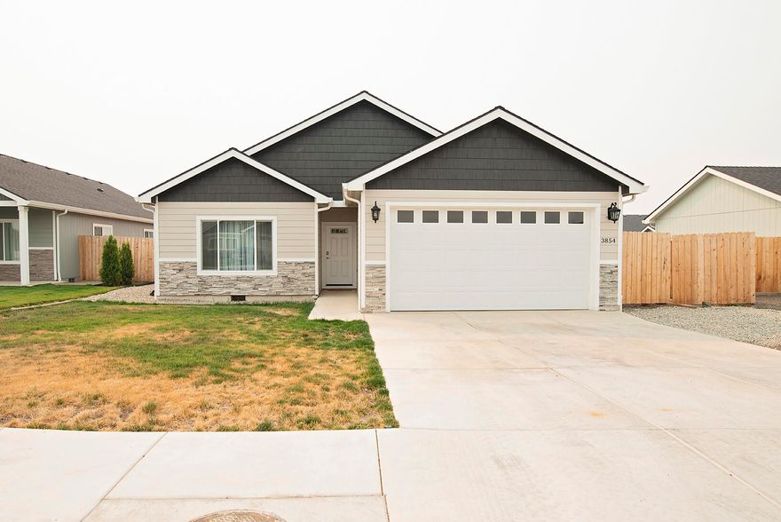 Welcome to this 3 bed / 2 bath, 2020 built, fantastic contemporary home! This home is less than a year old and ready for its new owners! Just under 1500 sq ft, you will enjoy a large, open concept great room, dining, and kitchen. Waterproof, wood plank laminate flooring and granite counters in kitchen with SS appliances. Kitchen has a pantry, island, and access to back patio. Primary bedroom is spacious with walk in closet, bath w/ granite counters and vinyl flooring. The other 2 bedrooms have plenty of space with large closets! Tall ceilings and windows throughout allow for an abundance of natural light! Dedicated laundry/utility room with storage has access to finished 2 car garage. The backyard is a blank slate for your imagination and includes a very large, covered patio with pavers, perfect for entertaining!! That's not all, this home offers RV/boat parking and additional room for storage and toys! You don't want to miss out on this one!