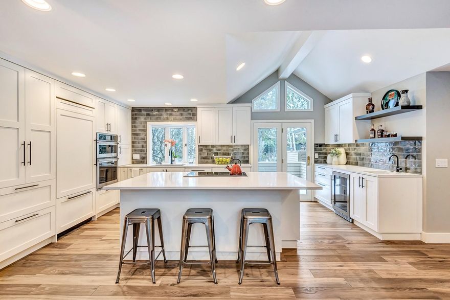 Stunning single level home in Sunrise Village . This beautiful home has been fully remodeled by Timberline Construction. The kitchen features new cabinetry with quartz counters. Light floods into the open and spacious living and dining room. Hardwoods throughout, with new carpet in the bedrooms. Bathrooms have designer finishes throughout. Sunrise Village amenities include a community pool, clubhouse, tennis courts, playground, trails, and private river access.