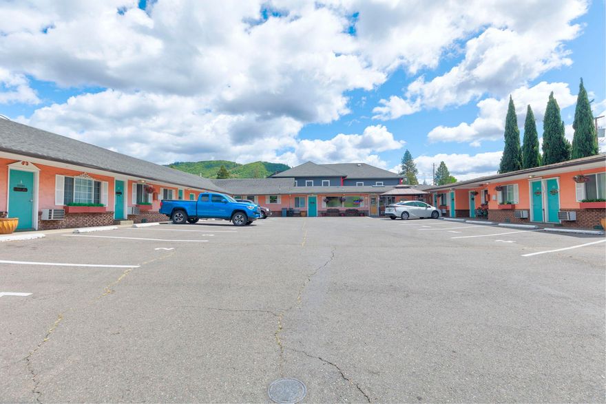 Here is the perfect chance to own a hotel with lots of excellent customer reviews! European charm, quaint, and clean. Beautifully decorated, each room having a different theme and well cared for. Close to the center of town. 14 units, with manager quarters. Nice sitting area under a canopy out front. Each unit has it's own parking space. All units have air conditioning, free wi-fi, microwave/refrigerator, and cable TV. So much to offer!