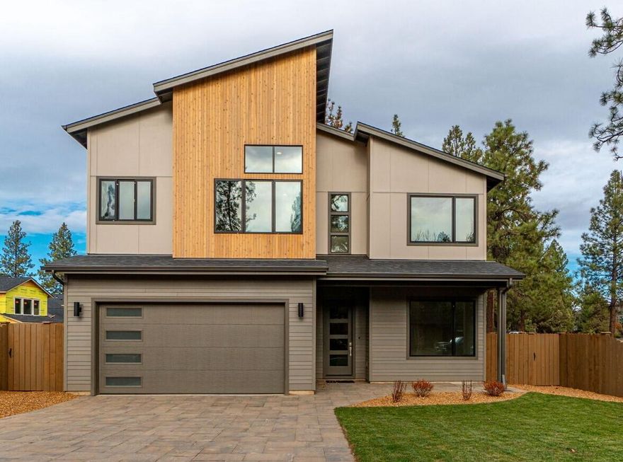 Just finished November 15th! Introducing a brand-new home by RD Building & Design LLC, offering a distinctive 3067 sqft mountain modern design nestled in an idyllic setting. This property boasts 3 bedrooms, 2.5 baths, a bonus room, and a dedicated office. With black-framed windows and two water heaters, it features 10' ceilings and vaulted areas that accentuate its open, airy feel. The primary suite is conveniently located on the main level and includes a luxurious walk-in tiled shower and a relaxing soaking tub. The home showcases hardwood flooring throughout and a chef-inspired kitchen with quartz countertops and commercial-style stainless appliances. This home has ample storage, including the 4-car tandem garage! Outside, find a fully fenced, professionally landscaped front and back yard ready for your enjoyment. An A/C system ensures your comfort throughout the seasons. The seller is offering $20,000 towards Buyer's closing costs.