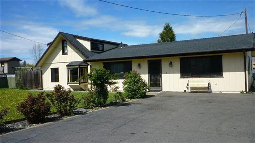 .67 acres in Medford City Limits, this 2108 sq. ft. home offers three bedrooms, two bathrooms, a family room and large living room, large laundry room off kitchen. Also, a detached studio apartment with granite countertops, vaulted ceiling and carport, a separate woodworking/hobby shop. Lots of parking, and Medford Irrigation. Studio apartment is a garage conversion. Property sold as-is.