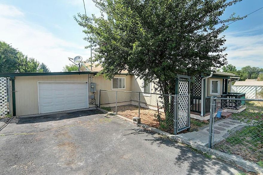 Move in Ready Home! Remodeled in 2007 / 08. New Roof as of August 2017! Electrical upgraded! Just under 1/2 acre home site. Detached shop and Shed. Garage is drive through to back yard. Updated Kitchen, formal dining and a large living room have been updated. Full water filter system, with filter access under the kitchen sink. Plenty of storage, several sheds, a fenced dog run, and a finished shop with electric.