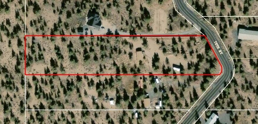 Rare opportunity to own Tumalo acreage under $400,000! Conveniently located between Bend and Redmond with easy access to Hwy 97.  The updated home features a spacious open floor plan with charming wood accents and exposed beams.  Open kitchen and plenty of natural wood cabinetry, offering both function and style. Recent updates include flooring, cabinetry, appliances, bathroom vanity, fixtures, and Trex decking on all porches. Situated on nearly 4 acres, this property is ready for your personal touch! So much can be done! Conveniently close to Bend and Redmond, you get the best of both worlds: serene country living with city amenities nearby.  Come and see the potential this property has to offer!