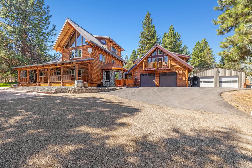 This custom Log Home sits in the center of 80 acres of groomed forest. Home is 4,650 sf with Radiator Floor heating consisting of 13 zones throughout home. In addition, there is a 23 K Generator Propane backup with 2-750-gallon Tanks. Heating comes from Oil or wood furnaces. Front entry is covered, and home has multiple handicap access. Front door opens into Living Room with Wood-Pellet stove, elevated ceiling and tile flooring. Off Living Room a Sunroom, Handicap lifts on all stairways to 2nd floors. Kitchen Tile Counter, On Demand Hot water sink, Double Ovens, Dishwasher, Hickory Cabinets, Refrigerator plus Washer Dryer in Laundry Room. Two Bedrooms are ADA compatible with walk-in closets. Common bathroom on main floor has Shower and Claw foot tub. There is a suite above garage with two bedrooms/ bathroom/ living room and small kitchenette for company. Backyard has covered porch plus covered hot tub gazebo. Topped off with beautiful waterfall.