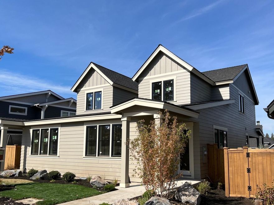 Price reduced! All the upgrades of yesterday at today's new price! The main level of this beautiful 3 bedroom, 2.5 bath townhome features a bright kitchen and dining area, great room with fireplace and custom built-ins. Upstairs you'll find the primary bedroom suite along with 2 additional bedrooms, full bath and utility area. The kitchen features solid surface counters, tile backsplash, island and stainless steel appliances. Engineered hardwood floors throughout main living area with tile floors in bathrooms/utility. Bathrooms have solid surface counters and tile backsplash. Primary bath has dual vanity, tile shower & walk-in closet. Wood wrapped windows add that extra brightness throughout. Covered patio for convenient outdoor living space. AC (ductless heat pump), front/rear yard landscape and fenced rear yard included!