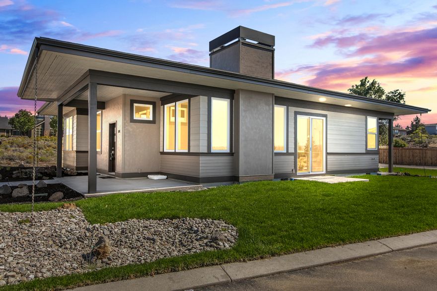 Earth Advantage Home! Lovely custom built new construction prairie style home in the sought after neighborhood of Yarrow. This single level 1715 Sq Ft home features inviting 10 foot ceilings throughout. Large open & airy great room offers built in storage space and double door pantry. Kitchen with large custom island, all slate stainless steel appliances included. Wonderful western views of the Cascade mountains from both the front and back porches.  3 bedrooms (front bedroom would also make a great office/den), second spare bedroom has walk in closet, and private door into hall bathroom.  Master suite separated from the other bedrooms, has large walk in closet, double sinks and walk in shower.  Spacious laundry area leading out to the attached double car garage with epoxy flooring. Home is located near walking paths, schools, hospital and only a few blocks from the Madras Aquatic Center.