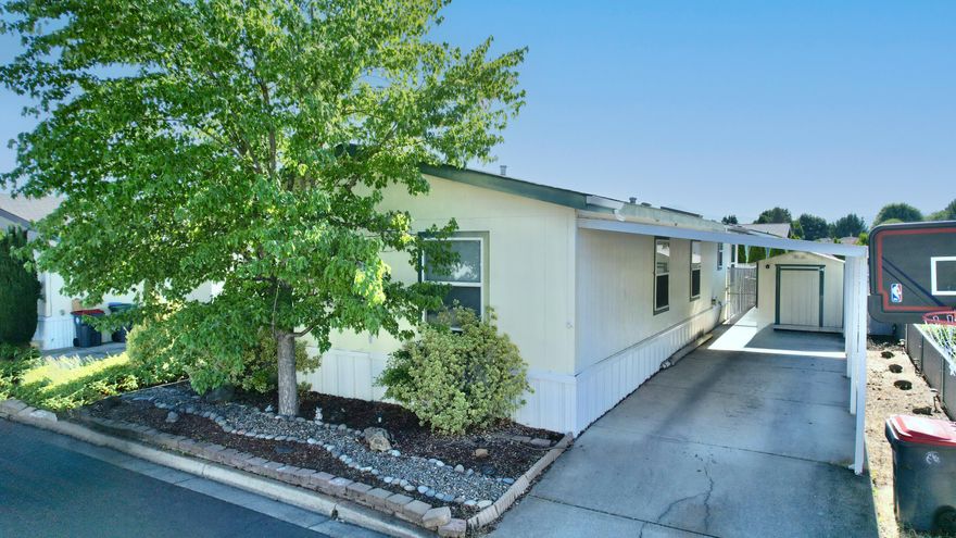 This 1998-built Palm Harbor manufactured home features 3 bedrooms and 2 bathrooms in a split floor plan. The recent addition of new laminate flooring adds a fresh and modern touch to the interior, enhancing its overall appeal. The property includes a spacious and fenced backyard, providing privacy and security, as well as a great outdoor space for various activities and pets. Additionally, there is an extra den or office, which offers flexibility to create a designated workspace or additional living area. Sellers are leaving additional flooring for buyers to finish the last 2-bedrooms. Priced to sell, it presents an attractive opportunity for prospective buyers looking for a ready-to-move-in home.