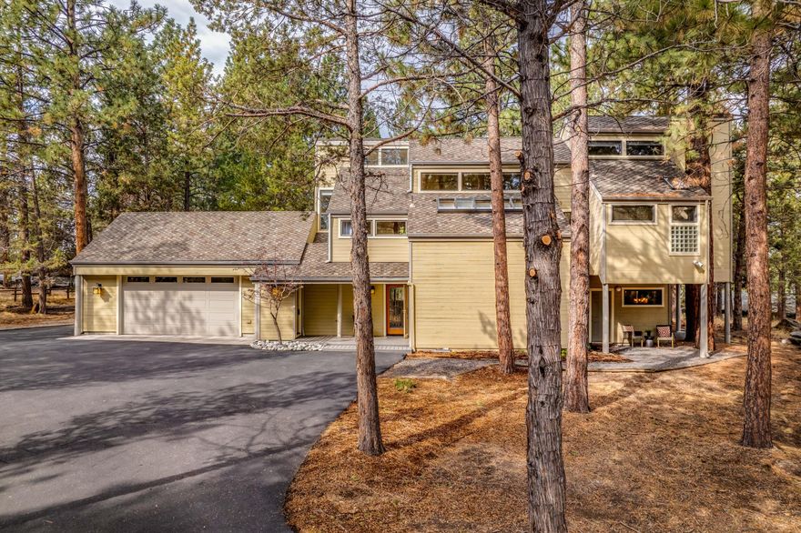 NEW PRICE! This truly stunning, custom built, contemporary home is perfectly situated on a 2.3 acre lot in the highly desirable Saddleback neighborhood.   Nestled in tall pines and located on the uphill side of Saddleback, this property enjoys gorgeous mountain views. The primary suite has a large private balcony overlooking the backyard and rock garden, large walk-in closet and beautifully renovated bath.  This quality home features a galley style kitchen open to the great room/dining area. Main level sauna, office space, skylights exposing the tall pines, tile and hardwood oak floors and cozy woodstove just add to this exquisite mountain home.  The exterior of the home is just as wonderful.  Enjoy the mountain views while relaxing in the hot tub. There's a large covered back yard patio, fire pit, professional grade rock climbing walls, add'l outbuildings and oversized, double garage with lots of extra storage.  There's something for everyone at this property.