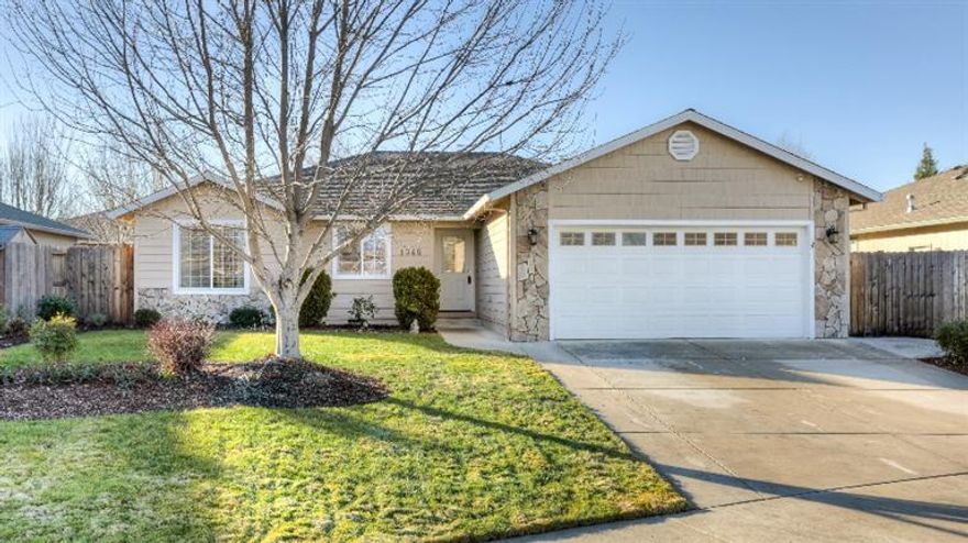 Immaculate single story home in a nice, quiet neighborhood near the new South Medford High School! 1346 sq. ft home offers 3 bedrooms & 2 full baths. Great room with beautiful natural light pouring in. Large kitchen with gas range & island has eat-in breakfast bar. Kitchen is beautifully appointed w/pendent lighting over island, cabinets w/crown molding & under-cabinet lighting. Kitchen is open to spacious dining room & family room. Upgraded features in the family room include; tray ceiling, ceiling fan & french doors leading to covered patio & backyard. Unwind in the master suite w/ tray ceiling, walk in closet & french doors to patio & hot tub. Master bath has double vanity & walk in shower. 2 additional bedrooms & full bath w/skylight. Indoor laundry has cabinets for storage. Backyard retreat has a covered patio w/ lawn area, sprinkler & drip system. Patio has been extended to width of home, as well as a path to the gate on side yard. Also a finished 2 car garage!