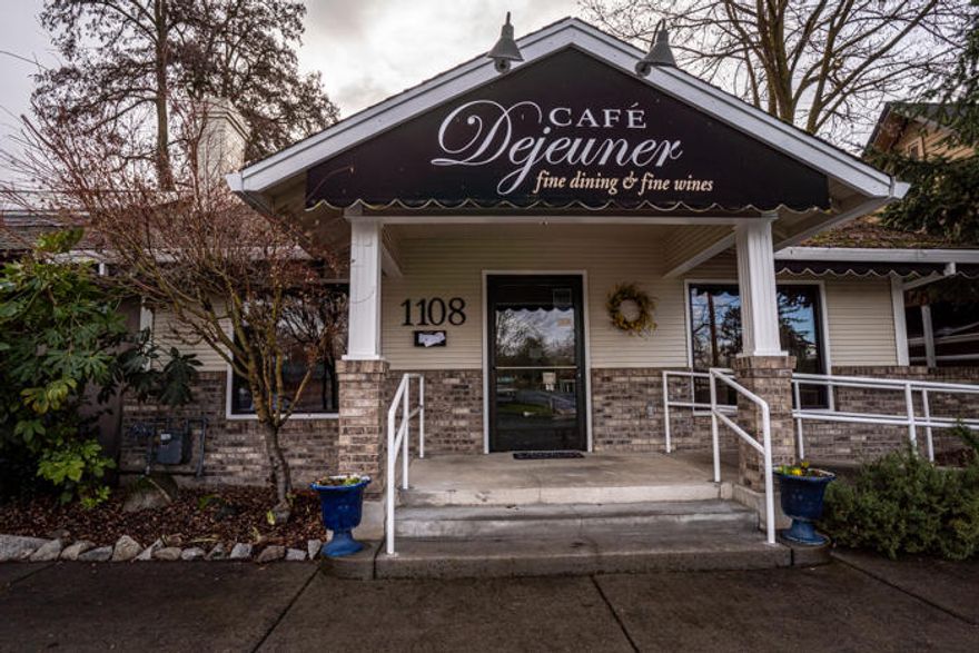 It's time for the owners to retire! Cafe' Dejeuner has been owned & operated by the same owners for 25 years. The restaurant enjoys a fabulous reputation ready for new owners to continue. The location is ideal, plenty of parking & the restaurant seats 42. There is cozy covered outside-dining available. The catering part of the business is also very successful. The structure was built in 1926 & much of the character still remains. The HVAC system & the hot water heater are new & the exterior was painted in 2019. The walk-in cooler, walk-in freezer & commercial range/oven stay with the property. The remaining equipment is negotiable outside escrow. If a restaurant is not in your future, the location is perfect for an attorney, real estate office, specialized retail, or ?? There is alley access in the back & two storage sheds. The basement (approx. 300 sq. ft.) is where the HVAC & hot water heater are located along with additional storage. What an opportunity!