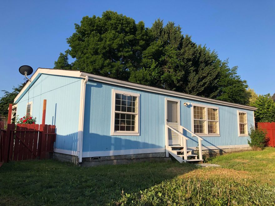 Conveniently located in Talent, Oregon, this comfortable 1993 manufactured home is now for sale. The home offers lots of natural light, 3 bedrooms, 2 full baths, and 1,188 sq ft of living space. Situated on a 0.21-acre lot, it meets zoning requirements for potential splitting. The property features a covered carport, large garden shed, and easy access to parks, schools, shopping, and dining. Ideal for first-time buyers, downsizers, or investors. The home may need some upgrading and repair. Buyers to do their own due diligence to explore the possibilities regarding zoning, and the condition of the home. Property sold As-Is.