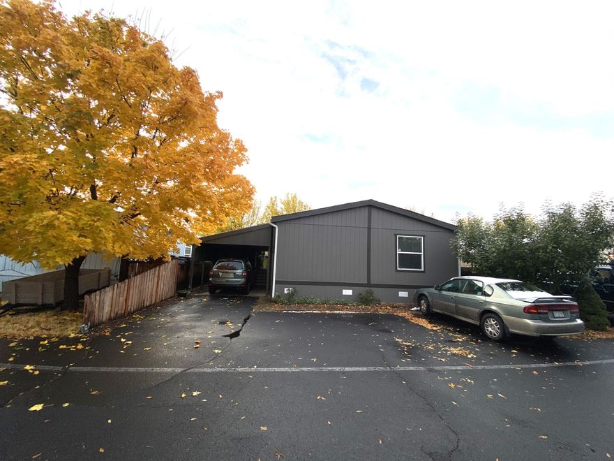 Immaculately maintained & beautifully remodeled 4 bedroom home in one of Central Oregon's most reasonably priced parks that allows dogs! This spacious home has tons of character & is like new with recent updates including; interior/exterior paint w/custom hand textured walls, windows, roof, beautifully refinished cabinets, tiled entrance, luxury LVP flooring, carpet, tile counters w/high end tile backsplash, tiled showers, stainless appliances, upgraded blinds, custom door/window casings, trim, & attractive built in's. Exterior features include; 4+ parking spots, covered carport, tons of covered storage & outdoor area w/concrete flooring, spacious workshop, shed w/shelving, nice private fenced back yard w/mature landscaping & trees, paver patio & walkway, large covered back deck, & convenient covered outdoor storage shelving. This home is in a great location w/easy access to all Central Oregon amenities & close to; dog park, schools, playground, dining, canyon trail, Hwy 97, & shopping