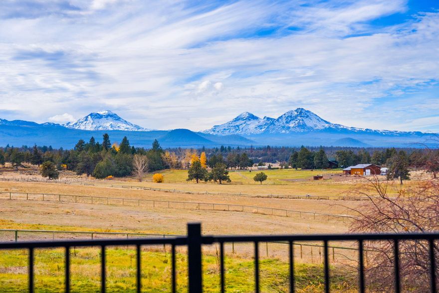 An extraordinary Central Oregon estate on just under 40 acres with panoramic Cascade Mountain views. This property features a beautifully designed multi-generational layout with a 2,068 sq. ft. west wing and 1,525 sq. ft. recreational space, both crafted for privacy and comfort. Outdoors offers a year round outdoor riding arena, fenced and cross fenced pastures, dry lots with shelters, and 28 acres of turn key underground irrigation. A basketball/ pickle ball court and private deeded easement to public lands to elevate your lifestyle. Your estate is designed for simplicity and seamless dreamland living.