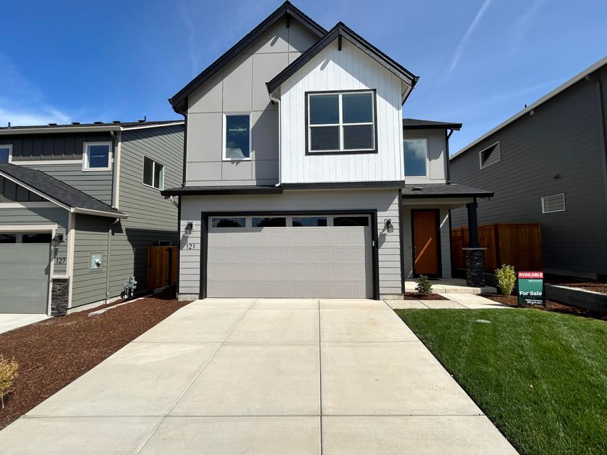 Special financing incentives available! MOVE IN READY! Welcome to Quail Run—a stunning community perched above the Eagle Point Golf Course, offering breathtaking views of the Table Rocks and surrounding mountains. This plan blends comfort and functionality in a light-filled, two-story layout designed for modern living. Broad sightlines, smart storage, and an open flow create a spacious feel throughout. Step onto the covered porch into a welcoming entryway, or enter through the garage into a mudroom with a spacious closet for coats and bags. The great room features large windows, a cozy fireplace, and flows into a stylish kitchen with an island, spacious pantry, and ample cabinet space. Upstairs, a versatile loft offers flexible space for work or play, along with three bedrooms and a conveniently located laundry room. The primary suite includes a coffered ceiling, walk-in closet, and a beautifully finished en-suite bath. This home is ready to welcome you.