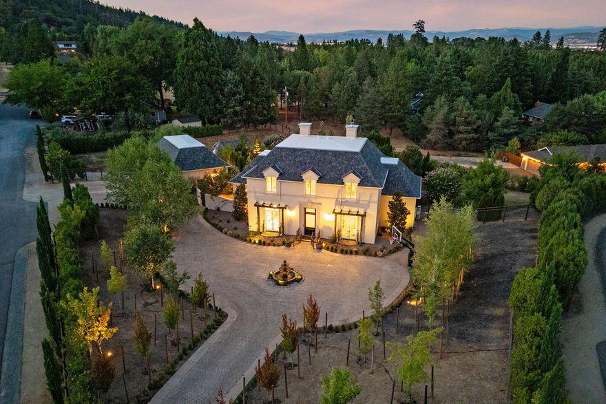 Glowing with charm and attention to detail inside and out, it's breathtaking. 12' ceilings and expansive windows, ample natural light filters through every detail of the home. Highlighting marble, granite, natural wood molding details throughout. Enjoy the cozy layout lounging around the large fireplace, cooking in the wonderful chef's kitchen, or enjoying the inviting pool and hot tub. Old world charm meets new era amenities in this 4 bedroom, 3 full bath home. 3 rooms located on the main level offer privacy and individual space. While the executive primary suite, located upstairs, offers all options, including dream walk in closet, steam shower, and reading room. This wonderful property also features a detached 3 car garage, well for irrigation, city water services, and the relaxing ambiance only a custom home like this could offer. New roof, new fencing and completely redone exterior top off this wonderful estate. All located in a Trail System into Historic Jacksonville's downtown!