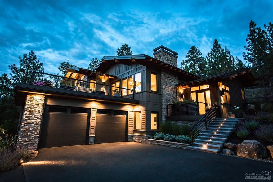 Timeless mountain-modern home, nestled in pine trees on the west side of Awbrey Butte, providing unmatched privacy, gorgeous sunsets & mountain views. Take advantage of inviting front & back outdoor living spaces w/beautiful landscaping, large decks & fenced yard. Unique opportunity to live on the Butte w/o an HOA. This high quality home finished in 2016 has clean lines & extraordinary attention to detail, with a dream kitchen appointed w/ Thermador appliances, reverse osmosis H20, wine fridge & walk-in pantry. Custom solid oak flooring throughout the home & marble tile adorns the master bathroom. Enjoy heated bathroom floors in the winters & cool A/C in the summers. Great room with vaulted ceilings & modern gas fireplace enhanced by wireless multi-room audio system that extends into the outdoor areas. Generous 2 car garage w/heated driveway, master on the main w/large walk-in closet, two bedrooms & a bonus room downstairs. Extend privacy w/.37 acre at 1981 Glassow Dr(201906561)