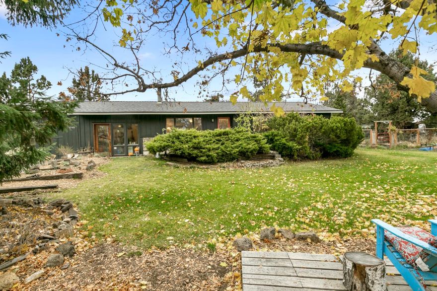 Come visit this private oasis on almost 1/2 acre in NE Bend just minutes from shopping, dining  & outdoor rec! Updated ranch offers cozy single-level living in the winter and plenty of room to make the most of the summer months in your huge yard & gardens! Brand new roof, new exterior paint and newer EPA cert. wood stove are only a few of the updates here. You'll appreciate 2 completely remodeled full bathrooms and a bonus room in addition to the living area! Keep both greenhouses or sellers will remove. Also find a spacious 1-car garage or shop if you prefer. Plenty of room to add another shop or garage too! Park all your recreation vehicles at home. And enjoy the privacy and opportunity of .47 ac right in town!