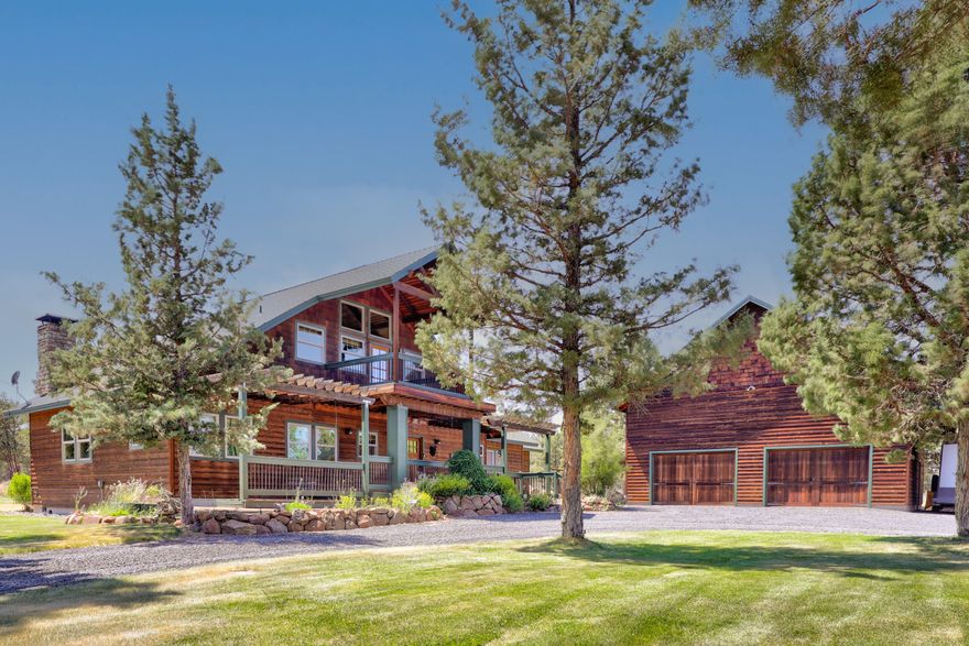 Truly a MUST SEE property, 3 Sisters Mt and Mt Jefferson views. 4 BR (3 with new carpet) 3 BA. 2 sty cedar sided home. Master suite added 2009 on 1st level with den/office attached. Vaulted ceiling, deck front and rear. Oversized 1440 sq. ft. garage/shop with 1440 second fl. for exercise or storage. 2-504 sq. ft. & 1-720 sq. ft. covered storage. 4 oversized stall 2800 sq. ft. barn, turnouts, auto heated waterers and heated insulated tack room. Water feature, pond and 320 sq. ft. studio with elect. and water. Room for R/V with elect. and water. All on quiet/private 11.6 acres, some adjacent to public land, and abundant wildlife. Wanona Rd is paved from Holmes Rd. to front of property.