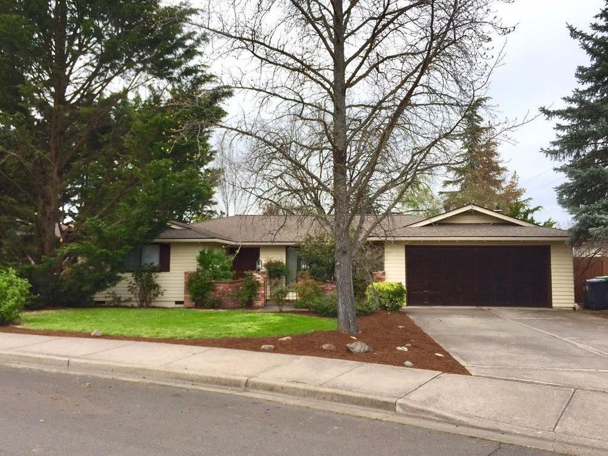 This 3 bedroom, 2 bath home has a great floor plan. With 2050 sq ft of living space, the rooms are open and spacious. Large formal, step down living room, formal dining room, dining area and large family room with a fireplace. All bedrooms are good size and the master bath has 2 separate sink areas. There is an indoor laundry room with storage. The home needs updating and some TLC, but has good bones and is in a great neighborhood near Asante Medical Center. Interior will be painted by mid June.