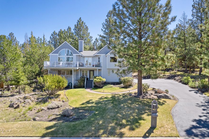 Perched atop Awbrey Butte this immaculate, custom built, one-owner home was thoughtfully designed to take advantage of the  Cascade Mtn views and provide a feeling of privacy & treetop living. The reverse-style floor plan features a sunny, vaulted open  great room w/ pristine Teak hardwoods, updated gourmet kitchen/dining area w/breakfast bar & loads of cabinet storage, picture  windows throughout the main level, gas fireplace, new Hunter Douglas blinds, multi-decks for outdoor living & entertaining, built-in  speakers, large primary suite w/double walk-in closets, bathroom soaking tub, large walk-in tiled shower & additional door access to  back deck. Additionally, the ground floor offers 2 spacious bedrooms plus a generous family room/bonus room with a gas fireplace,  deck to backyard, full bathroom & 3 car garage. The park-like .59 acre lot has a mix of native landscaping & mature trees along with flat landscaped areas-ideal for those seeking privacy and tranquility.