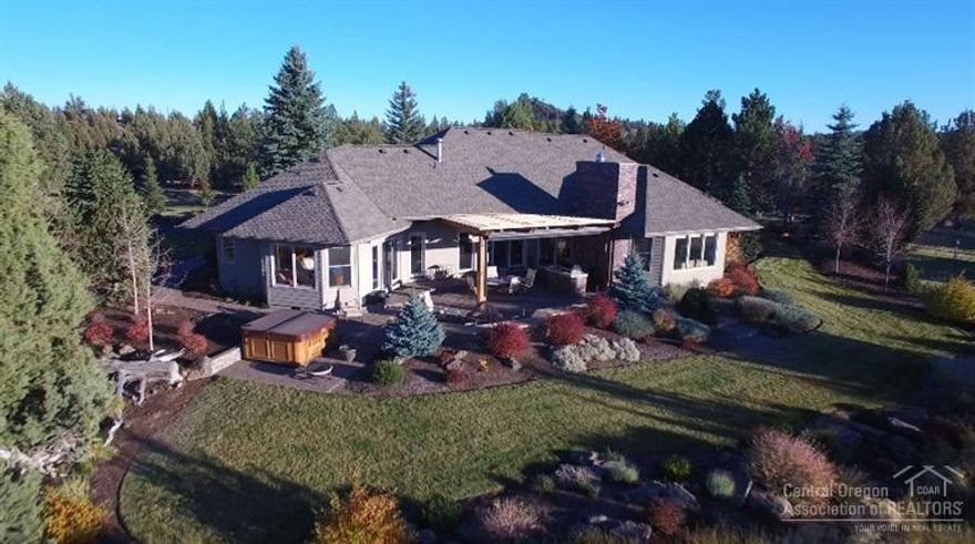 Exquisite rural home in secluded setting on almost 20 acres w/ panoramic mountain views from most rooms! High quality single level home w/ heated deck, gourmet maple kitchen, great master suite, private office, formal dining & bonus room. Triple garage, large shop/RV garage plus new 2 story barn/storage building. Great horse/dog set up with new fencing & shelter. Winding driveway to security gate, fully landscaped w/ water feature...truly a magnificent home w/ privacy & room for critters & toys.