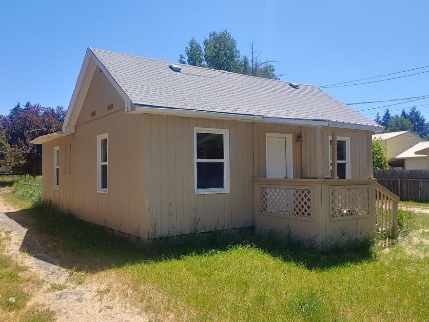Small little cottage on a large lot with tons of potential!