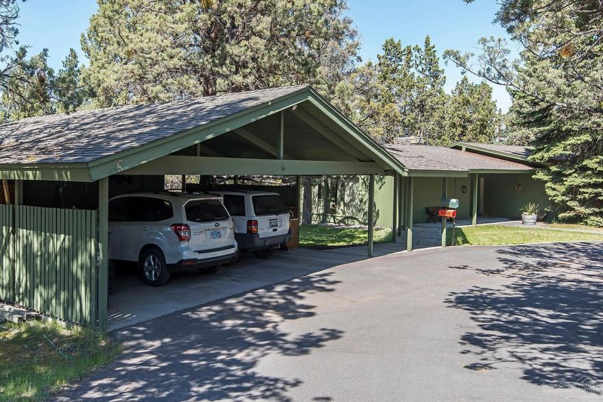 Potential Development Property! Mid Century modern home on 1.63 acres located between St. Charles Hospital & Pilot Butte Middle School. Home is single level with vaulted ceilings in living room, rock natural gas fireplace, and floor to ceiling windows over looking pastoral serene setting. Kitchen is open to dining area with an abundance of counter & drawer space for one who loves to cook. Kitchen pantry is a walk-in with room to place extra refrigerator/freezer. Family room/sunroom is great for entertaining. Outdoors is nestled with trees, completely fenced with horse stable, 2-stalls, covered carport and enclosed shop area. This home is perfect for a family or retiree who wants a home with no step entry, large hallway and easy access throughout this spacious custom home. Buyer's responsibility to perform due diligence with city planning on potential development possibilities.